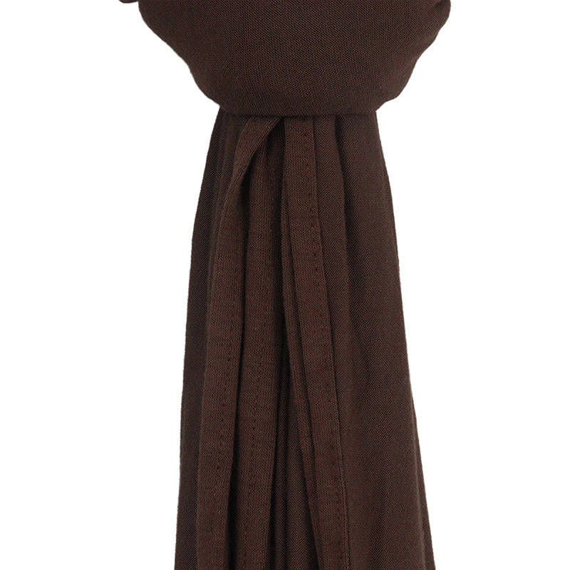 Close-up of the cocoa brown premium jersey hijab draped and gathered, highlighting its thick, breathable material and finished edges.
