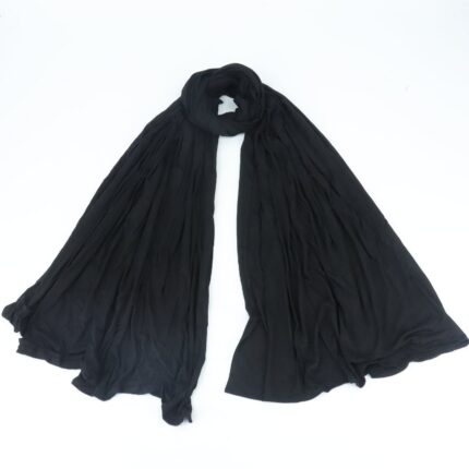 Close-up of the ultra-soft, stretchable black premium jersey hijab fabric showing its breathable and thick, non-transparent texture.