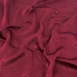 Maroon velvet satin hijab with a soft, light-catching sheen