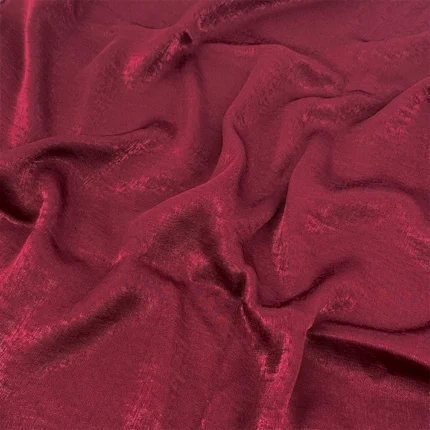 Maroon velvet satin hijab with a soft, light-catching sheen