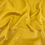 Sunflower yellow velvet satin hijab with a soft, light-catching sheen