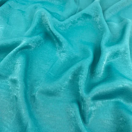 Turquoise blue velvet satin hijab with a soft, light-catching sheen