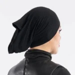 Black jersey undercap that keeps chiffon and satin hijabs from slipping