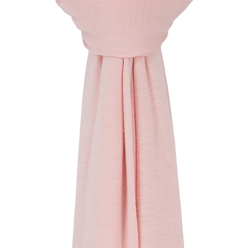 Close-up of the ultra-soft, stretchable pink premium jersey hijab fabric showing its breathable and thick, non-transparent texture.