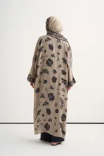 Floral floss abaya in taupe by Tülin Moda, an open-front long abaya